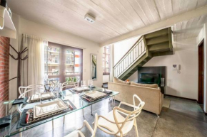 Bright loft with balcony overlooking the square